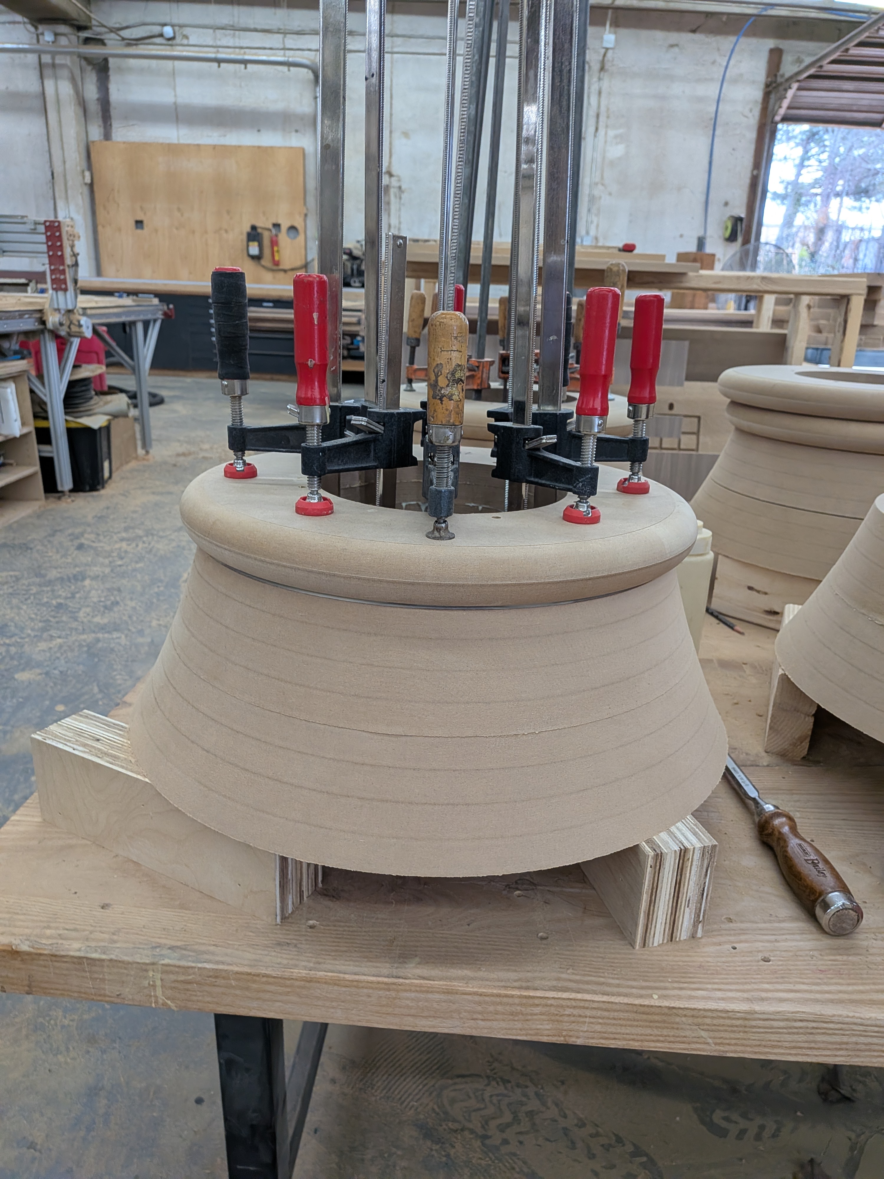Leg glue-up in progress in the shop